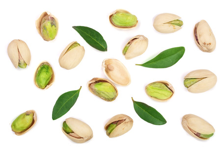 Pistachios with leaves isolated on white background, top view. Flat lay pattern
