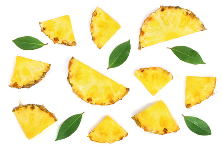 Sliced pineapple with green leaves isolated on white background. Top view. Flat lay patternの写真素材
