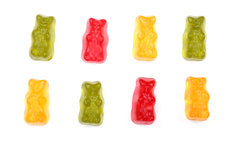 Colorful eat gummy bears jelly candy Isolated on white background. Top view. Flat layの写真素材