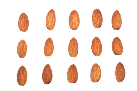 almonds isolated on white background. Flat lay pattern. Set or collection.の写真素材
