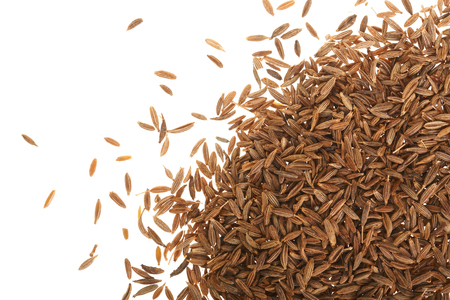 Cumin or caraway seeds isolated on white background. Top view