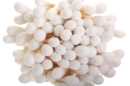 Cotton ear stick isolated on white background macro top view. Flat layの写真素材