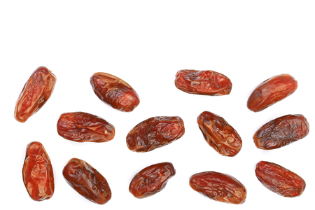 dry dates isolated on white background with copy space for your text. Top view. Flat lay pattern.の写真素材