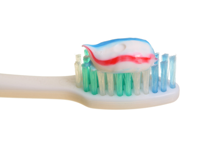 Toothbrush with toothpaste. Isolated on white background.の写真素材