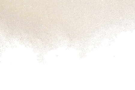 Heap of granulated sugar isolated on white background. Top view. Flat lay.の写真素材