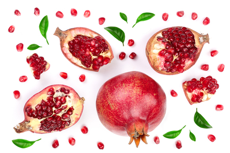 pomegranate with leaves isolated on white background. Top view. Flat lay patternの写真素材