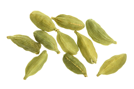 Green cardamom seeds isolated on white background. Top view. lay flatの写真素材