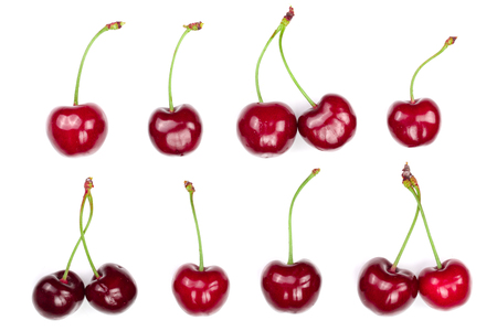 Sweet red cherries isolated on white background. Top view. Flat lay patternの写真素材