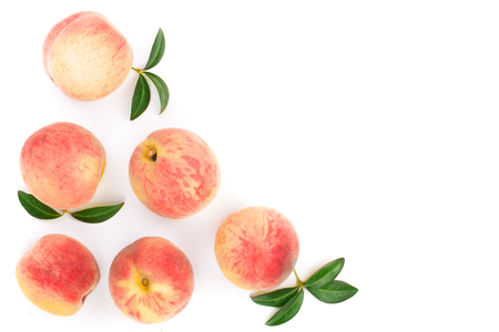 ripe peaches with leaves isolated on white background with copy space for your text. Top view. Flat lay patternの写真素材