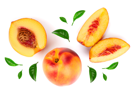 ripe nectarine with leaves isolated on white background. Top view. Flat lay pattern.の写真素材