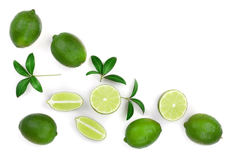 sliced lime with leaves isolated on white background with copy space for your text.. Top view. Flat lay pattern.の写真素材