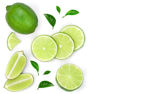 sliced lime vith leaves isolated on white background with copy space for your text. Top view. Flat lay patternの写真素材