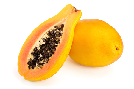 ripe cut papaya isolated on a white backgroundの写真素材