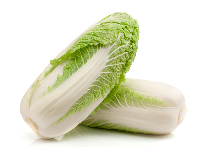 Two chinese cabbage and half isolated on whiteの写真素材
