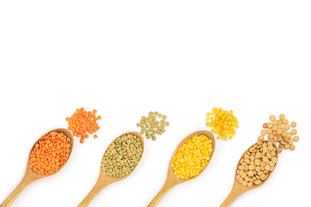 yellow, red end green lentil in wooden spoon isolated on white background with copy space for your text. Top viewの写真素材