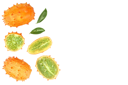 Kiwano or horned melon with leaves isolated on white background with copy space for your text. Top view. Flat layの写真素材