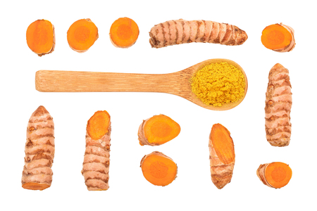 Turmeric powder and turmeric root isolated on white background. Top view. Flat layの写真素材