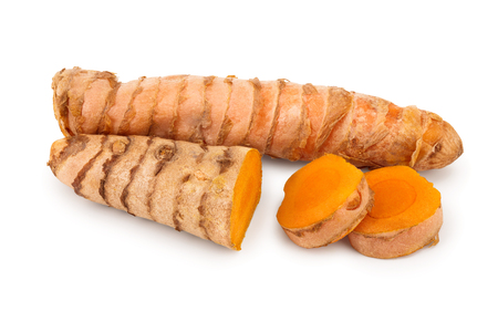 turmeric root and slices isolated on white background.の写真素材