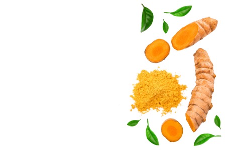 Turmeric powder and turmeric root isolated on white background with copy space for your text. Top...