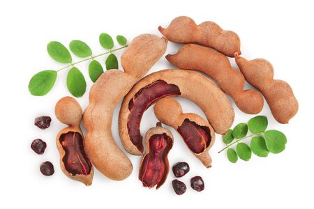 Tamarind fruit with leaf and seed isolated on white background, Top view. Flat layの写真素材
