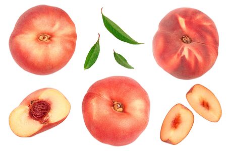 Ripe chinese flat peach fruit and half with leaf isolated on white background. Top view. Flat layの写真素材