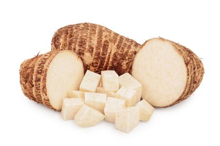 fresh taro root with slices isolated on white backgroundの写真素材