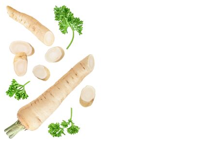 Parsley root with slices and leaves isolated on white background with copy space for your text. Top view. Flat layの写真素材