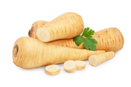 Parsnip root and slices with parsley isolated on white background closeup.の写真素材