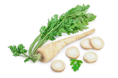 Parsley root with slices and leaves isolated on white backgroundの写真素材