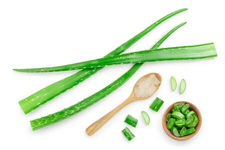 Aloe vera with slices in wooden spoon isolated on white background with copy space for your text. Top view. Flat lay.の写真素材