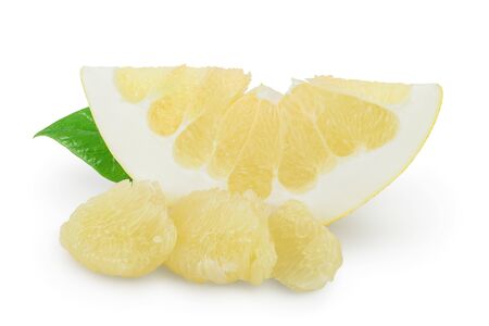 Pomelo slice with leaf isolated on whiteの写真素材