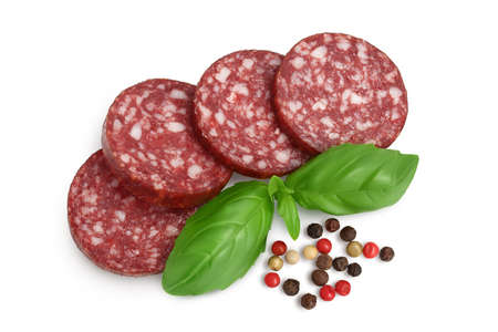 Smoked sausage salami slices isolated on white background with clipping path and full depth of field. Top view. Flat layの写真素材