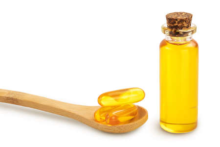 Fish oil in bottle isolated on white background with clipping path and full depth of fieldの写真素材