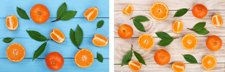 orange or tangerine with leaves on blue wooden background. Flat lay, top view. Fruit compositionの写真素材