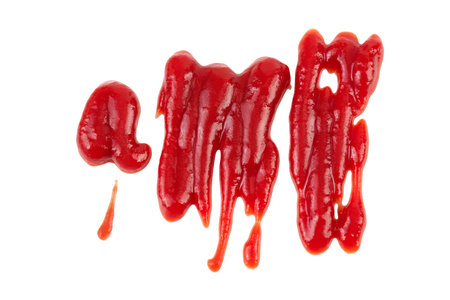 Red tomato sauce or ketchup isolated on white background . Top view. Flat layの写真素材