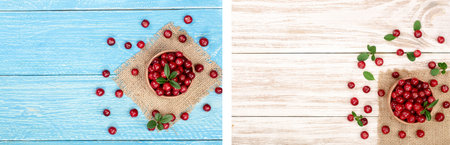 Cranberry with leaf in bowl on wooden background with copy space for your text. Top view