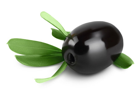Black olives with leaves isolated on a white background with full depth of field.の写真素材