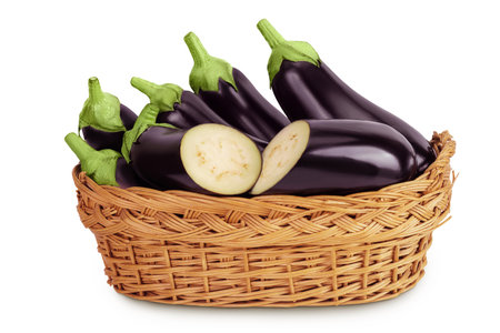 eggplant in a wicker basket isolated on white background with full depth of fieldの写真素材