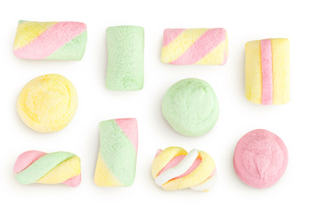 Colorful mini marshmallows isolated on white background with full depth of field. Top view. Flat layの写真素材