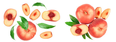 Ripe chinese flat peach fruit and half with leaf isolated on white background with copy space for your text. Top view. Flat layの写真素材