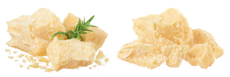 Pieces of parmesan cheese with rosemary isolated on white backgroundの写真素材