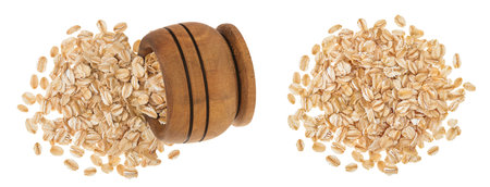 Oat flakes in wooden bowl isolated on white background with full depth of field. Top view. Flat layの写真素材
