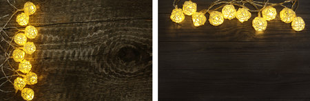 christmas garland lights on old wooden background with copy space for your text. Top view