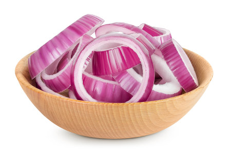 Red onion slices in wooden bowl isolated on a white backgroundの写真素材
