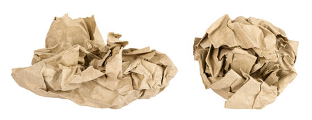 Crumpled brown sheet of paper isolated on white backgroundの写真素材