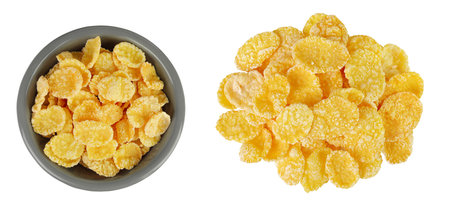Cornflakes in ceramic bowl isolated on white background. Top view. Flat lay