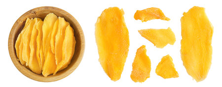 dried mango in wooden bowl isolated on white background. Top view. Flat layの写真素材