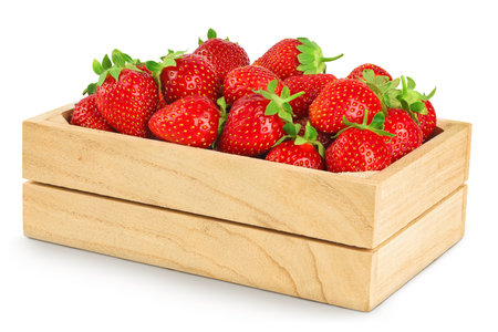 Strawberry in a wooden box isolated on white backgroundの写真素材