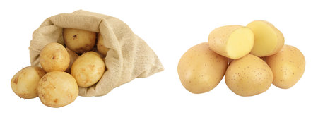 young potato slices in a wooden bowl isolated on white background. Harvest newの写真素材