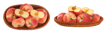 flat donut peaches in a wicker basket isolated on white background. Top view. Flat layの写真素材